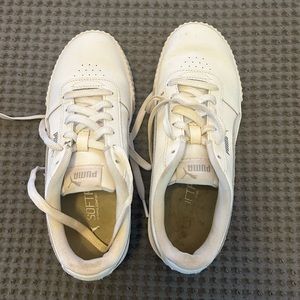 White platform Puma sneakers